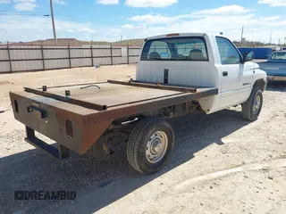 1999 Dodge Ram 2500 with VIN 3B7KF26Z7XM582856, listed as a IAAI auction lot 41891064 with 26,179 mi miles. Bid and sale history available at carsss.com. Image 4.