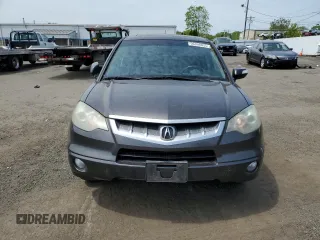 2009 Acura RDX z VIN 5J8TB18289A004485, wystawiony jako Copart lot #56356035 z przebiegiem 228 783 mil mil oraz Szkoda całkowita • Salvage title. Historia ofert i sprzedaży dostępna na DreamBid. Obrazek 5.