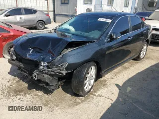 2004 Acura TSX w/Navigation with VIN JH4CL96994C023939, listed as a Copart auction lot 62551085 with 158,497 mi miles and Salvage title. Bid and sale history available at DreamBid. Image 1.