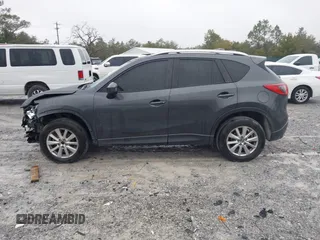 2015 Mazda CX-5 Touring with VIN JM3KE2CY4F0435563, listed as a IAAI auction lot 41311988 with 187,183 mi miles. Bid and sale history available at carsss.com. Image 14.