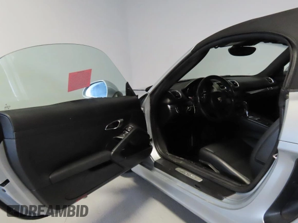 2014 Porsche Boxster with VIN WP0CA2A83ES120705, listed as a Copart auction lot 58605535 with 65,603 mi miles and Salvage title. Bid and sale history available at DreamBid. Image 8.