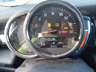 2019 MINI Hardtop Cooper with VIN WMWXP5C57K2H30039, listed as a IAAI auction lot 42301699 with 67,473 mi miles and . Bid and sale history available at DreamBid. Image 7.