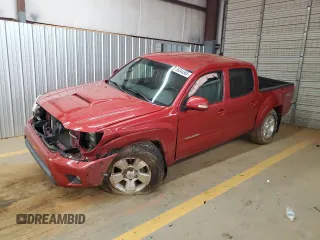 2015 Toyota Tacoma z VIN 5TFLU4EN1FX127854, wystawiony jako Copart lot #56044565 z przebiegiem 145 207 mil mil oraz Szkoda całkowita • Salvage title. Historia ofert i sprzedaży dostępna na DreamBid. Obrazek 1.