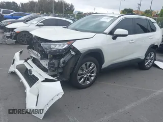 2021 Toyota RAV4 XLE Premium with VIN 2T3C1RFV2MW184327, listed as a IAAI auction lot 42188008 with 80,566 mi miles and . Bid and sale history available at DreamBid. Image 2.