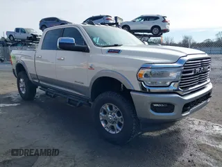 2022 Ram 2500 Laramie with VIN 3C6UR5FLXNG105323, listed as a IAAI auction lot 41359667 with 33,266 mi miles. Bid and sale history available at carsss.com. Image 1.