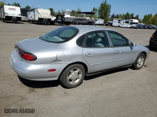 1999 Ford Taurus SE with VIN 1FAFP53U9XG171645, listed as a Copart auction lot 53187385 with 180,644 mi miles and Clean Title. Bid and sale history available at carsss.com. Image 3.