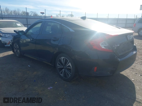2016 Honda Civic EX-T z VIN 2HGFC1F3XGH630558, wystawiony jako IAAI lot #41868334 z przebiegiem 154 452 mil mil oraz . Historia ofert i sprzedaży dostępna na DreamBid. Obrazek 3.