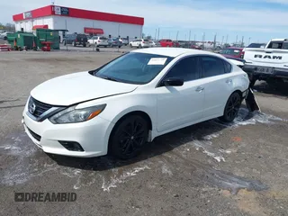 2017 Nissan Altima SR with VIN 1N4AL3AP7HC218218, listed as a IAAI auction lot 41848359 with 175,626 mi miles and . Bid and sale history available at carsss.com. Image 2.