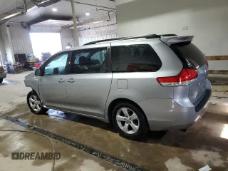 2012 Toyota Sienna LE AAS with VIN 5TDKK3DC6CS264818, listed as a Copart auction lot 52145145 with 143,510 mi miles and Salvage Title. Bid and sale history available at carsss.com. Image 2.