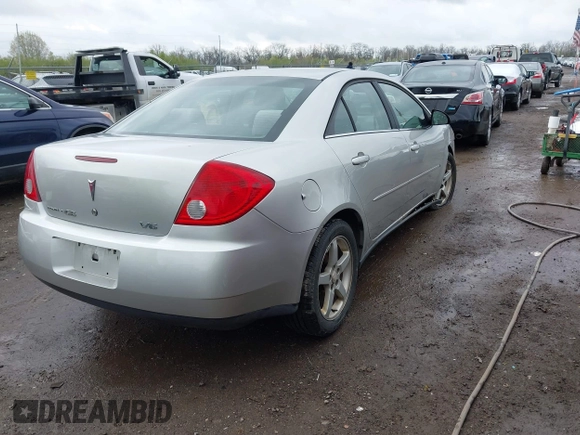 2006 Pontiac G6 6-Cyl with VIN 1G2ZG558464289212, listed as a IAAI auction lot 41994843 with 126,502 mi miles. Bid and sale history available at carsss.com. Image 4.