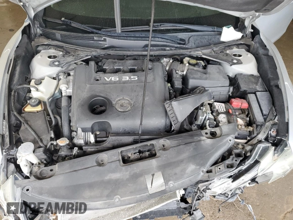 2016 Nissan Altima SL z VIN 1N4BL3AP5GC197078, wystawiony jako Copart lot #58868735 z przebiegiem 199 991 mil mil oraz Szkoda całkowita • Salvage title. Historia ofert i sprzedaży dostępna na DreamBid. Obrazek 11.