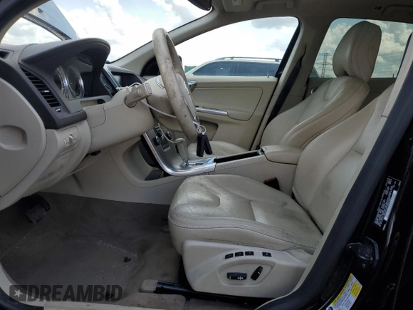 2012 Volvo XC60 PZEV with VIN YV4940DZ4C2302482, listed as a Copart auction lot 61491205 with 92,967 mi miles and Salvage title. Bid and sale history available at DreamBid. Image 7.