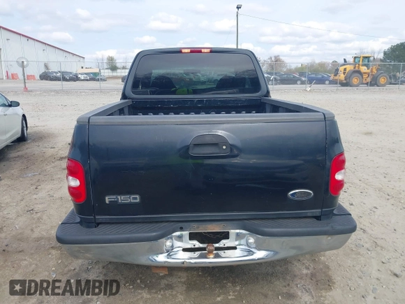2000 Ford F-150 XL with VIN 1FTZX0725YKA09559, listed as a IAAI auction lot 41810954 with Not provided miles and . Bid and sale history available at DreamBid. Image 16.