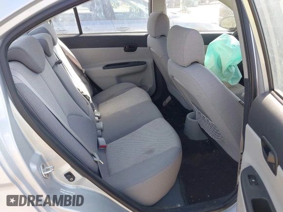 2009 Hyundai Accent Auto GLS z VIN KMHCN46C69U326197, wystawiony jako IAAI lot #42268198 z przebiegiem 74 308 mil mil oraz . Historia ofert i sprzedaży dostępna na DreamBid. Obrazek 8.