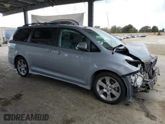 2013 Toyota Sienna SE with VIN 5TDXK3DC6DS386716, listed as a Copart auction lot 63122435 with 77,371 mi miles and Salvage title. Bid and sale history available at DreamBid. Image 4.