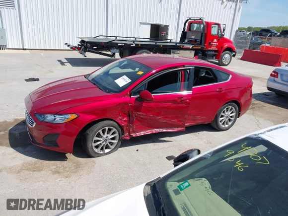 2020 Ford Fusion SE z VIN 3FA6P0HD8LR104422, wystawiony jako IAAI lot #42092244 z przebiegiem 55 438 mil mil oraz . Historia ofert i sprzedaży dostępna na DreamBid. Obrazek 14.