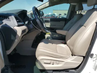 2019 Honda Odyssey Touring with VIN 5FNRL6H86KB089055, listed as a Copart auction lot 56980975 with 154,842 mi miles and Salvage title. Bid and sale history available at DreamBid. Image 7.