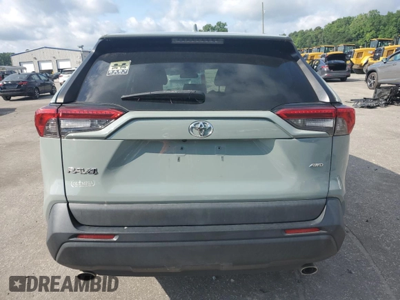 2020 Toyota RAV4 XLE with VIN 2T3P1RFV2LC084813, listed as a Copart auction lot 59567615 with 126,676 mi miles and Salvage title. Bid and sale history available at DreamBid. Image 6.