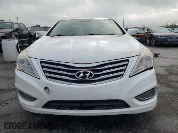 2013 Hyundai Azera с VIN KMHFG4JG8DA228669, выставлен на аукционе Copart как лот 62734185 с пробегом 148 611 миль миль и Чистый • Clean title. История ставок и продаж доступна на DreamBid. Изображение 5.