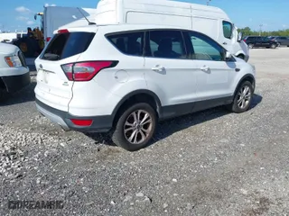 2017 Ford Escape SE with VIN 1FMCU0GDXHUD45191, listed as a IAAI auction lot 41883627 with 120,034 mi miles. Bid and sale history available at carsss.com. Image 4.