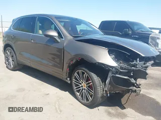 2015 Porsche Cayenne Turbo z VIN WP1AC2A27FLA82984, wystawiony jako IAAI lot #42290464 z przebiegiem 114 185 mil mil oraz . Historia ofert i sprzedaży dostępna na DreamBid. Obrazek 1.