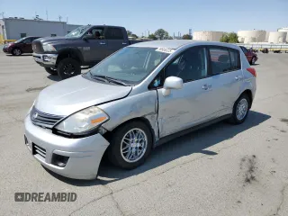 2010 Nissan Versa S with VIN 3N1BC1CP1AL408030, listed as a Copart auction lot 59906325 with 125,243 mi miles and Salvage title. Bid and sale history available at DreamBid. Image 1.