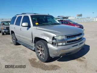 2005 Chevrolet Tahoe LT with VIN 1GNEC13T85J254296, listed as a IAAI auction lot 41676900 with 214,305 mi miles. Bid and sale history available at carsss.com. Image 1.