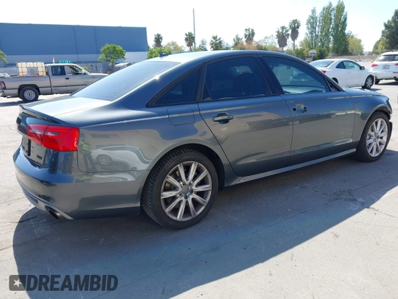 2014 Audi A6 3.0T Prestige with VIN WAUHGAFC9EN028196, listed as a IAAI auction lot 41993806 with 100,215 mi miles. Bid and sale history available at carsss.com. Image 4.