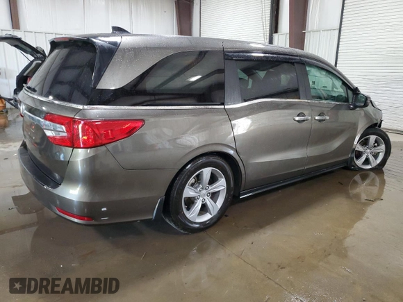 2018 Honda Odyssey EX-L z VIN 5FNRL6H77JB013494, wystawiony jako Copart lot #56348745 z przebiegiem 21 368 mil mil oraz Szkoda całkowita • Salvage title. Historia ofert i sprzedaży dostępna na DreamBid. Obrazek 3.