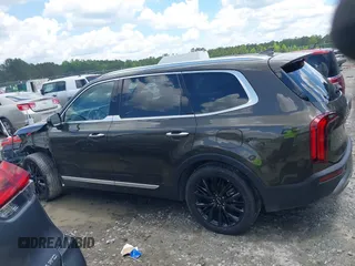 2022 Kia Telluride SX with VIN 5XYP5DHC3NG306763, listed as a IAAI auction lot 42267394 with 110,000 mi miles and . Bid and sale history available at DreamBid. Image 14.