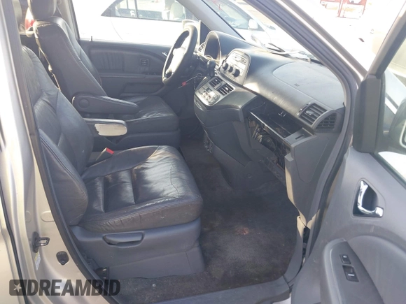 2005 Honda Odyssey TOURING with VIN 5FNRL38875B004209, listed as a IAAI auction lot 42003057 with 242,794 mi miles. Bid and sale history available at carsss.com. Image 5.
