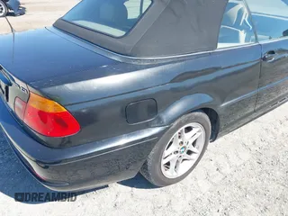 2004 BMW 3 Series 325Ci with VIN WBABW33414PL28254, listed as a IAAI auction lot 41785394 with 129,235 mi miles. Bid and sale history available at carsss.com. Image 13.