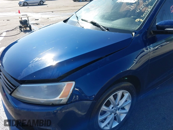 2011 Volkswagen Jetta SE with VIN 3VWDZ7AJ5BM319334, listed as a IAAI auction lot 42275321 with 111,989 mi miles and . Bid and sale history available at DreamBid. Image 18.
