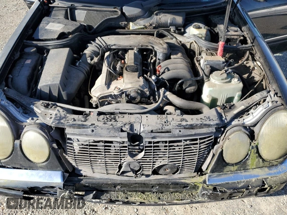 1997 Mercedes-Benz E-Class with VIN WDBJF55F5VJ028552, listed as a Copart auction lot 84172054 with 308,426 mi miles and Clean Title. Bid and sale history available at carsss.com. Image 11.