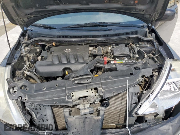 2010 Nissan Versa S with VIN 3N1BC1CP1AL460502, listed as a Copart auction lot 61106935 with 217,945 mi miles and Salvage title. Bid and sale history available at DreamBid. Image 11.