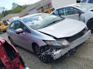 2014 Honda Civic Sedan EX-L with VIN 19XFB2F92EE034509, listed as a IAAI auction lot 41941168 with 89,926 mi miles. Bid and sale history available at carsss.com. Image 1.