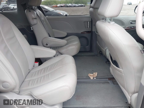 2014 Toyota Sienna XLE with VIN 5TDYK3DC0ES436502, listed as a IAAI auction lot 42180990 with 154,839 mi miles and . Bid and sale history available at DreamBid. Image 8.