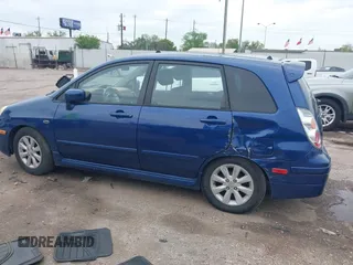 2005 Suzuki Aerio SX with VIN JS2RC61H555303720, listed as a IAAI auction lot 41911707 with 138,286 mi miles and . Bid and sale history available at DreamBid. Image 14.