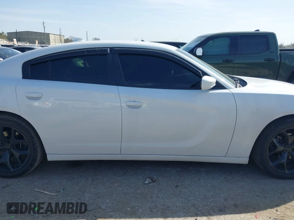 2015 Dodge Charger SXT with VIN 2C3CDXHG8FH725446, listed as a IAAI auction lot 41742400 with 84,579 mi miles and . Bid and sale history available at DreamBid. Image 13.