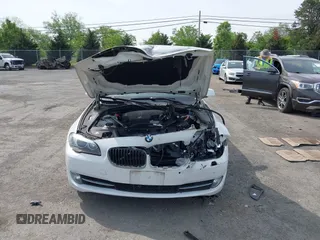 2013 BMW 5 Series 528i xDrive with VIN WBAXH5C54DD107317, listed as a IAAI auction lot 42244446 with 47,858 mi miles and . Bid and sale history available at DreamBid. Image 12.