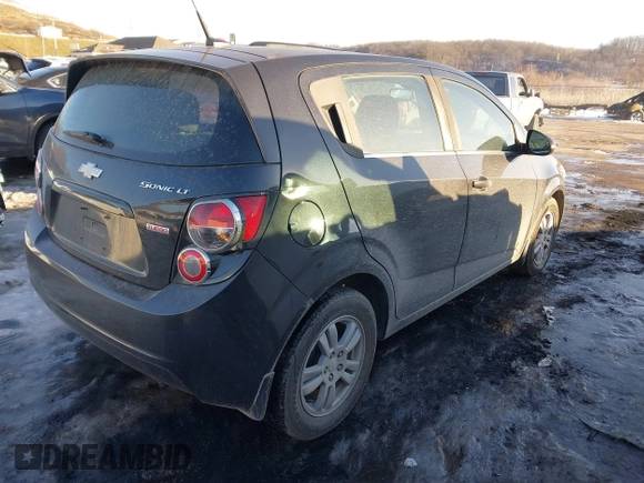 2013 Chevrolet Sonic LT with VIN 1G1JC6SB2D4256838, listed as a IAAI auction lot 41443769 with 98,839 mi miles. Bid and sale history available at carsss.com. Image 4.
