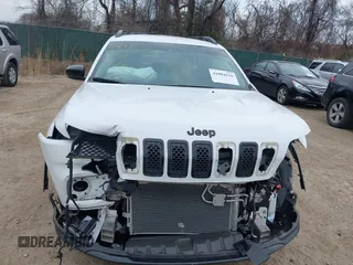 2023 Jeep Cherokee Altitude Lux z VIN 1C4PJMMB9PD101541, wystawiony jako IAAI lot #41904235 z przebiegiem 16 690 mil mil oraz . Historia ofert i sprzedaży dostępna na DreamBid. Obrazek 12.