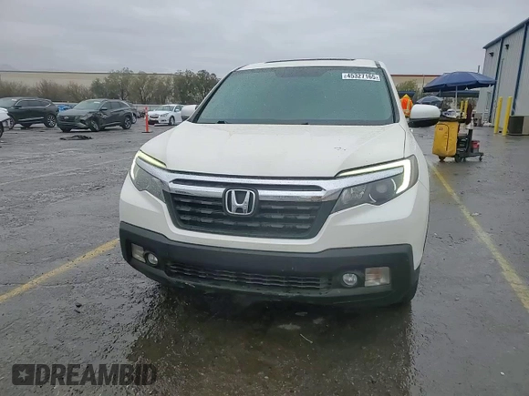 2019 Honda Ridgeline RTL-T with VIN 5FPYK2F61KB001996, listed as a Copart auction lot 45327165 with 57,018 mi miles and Salvage title. Bid and sale history available at DreamBid. Image 13.