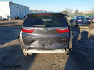 2017 Honda CR-V Touring with VIN 2HKRW2H90HH647274, listed as a IAAI auction lot 41572666 with 95,264 mi miles. Bid and sale history available at carsss.com. Image 17.