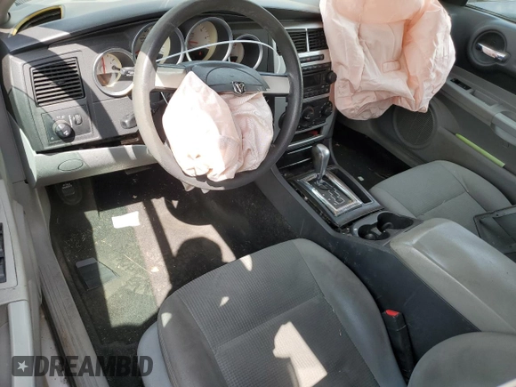 2007 Dodge Magnum z VIN 2D4FV47V47H816433, wystawiony jako Copart lot #62767934 z przebiegiem 191 015 mil mil oraz Szkody całkowita. Historia ofert i sprzedaży dostępna na DreamBid. Obrazek 8.