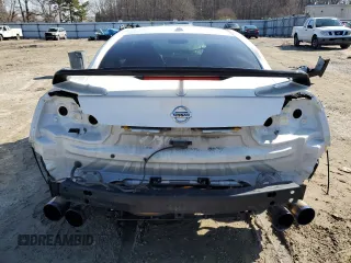 2018 Nissan GT-R Premium с VIN JN1AR5EF9JM710421, выставлен на аукционе Copart как лот 84895244 с пробегом 27 217 миль миль и Списание • Salvage title. История ставок и продаж доступна на DreamBid. Изображение 6.