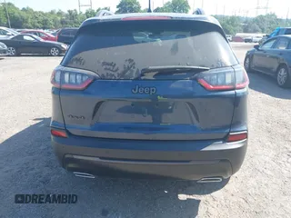 2021 Jeep Cherokee Latitude Lux z VIN 1C4PJMMX8MD205199, wystawiony jako IAAI lot #42556584 z przebiegiem 32 787 mil mil oraz . Historia ofert i sprzedaży dostępna na DreamBid. Obrazek 17.
