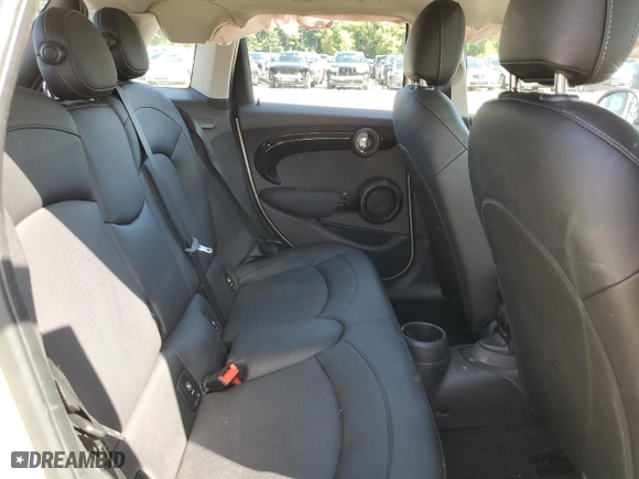 2019 MINI Hardtop 4 Door Cooper with VIN WMWXU1C56K2H74308, listed as a Copart auction lot 73110974 with 76,307 mi miles and Salvage Title. Bid and sale history available at carsss.com. Image 11.