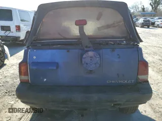 1998 Chevrolet Tracker z VIN 2CNBJ1863W6906496, wystawiony jako Copart lot #87368314 z przebiegiem 144 557 mil mil oraz Czysty tytuł • Clean title. Historia ofert i sprzedaży dostępna na DreamBid. Obrazek 7.