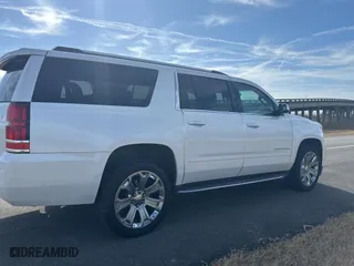 2017 Chevrolet Suburban Premier with VIN 1GNSCJKC0HR170239, listed as a Copart auction lot 43554155 with 141,903 mi miles and Clean Title. Bid and sale history available at carsss.com. Image 4.